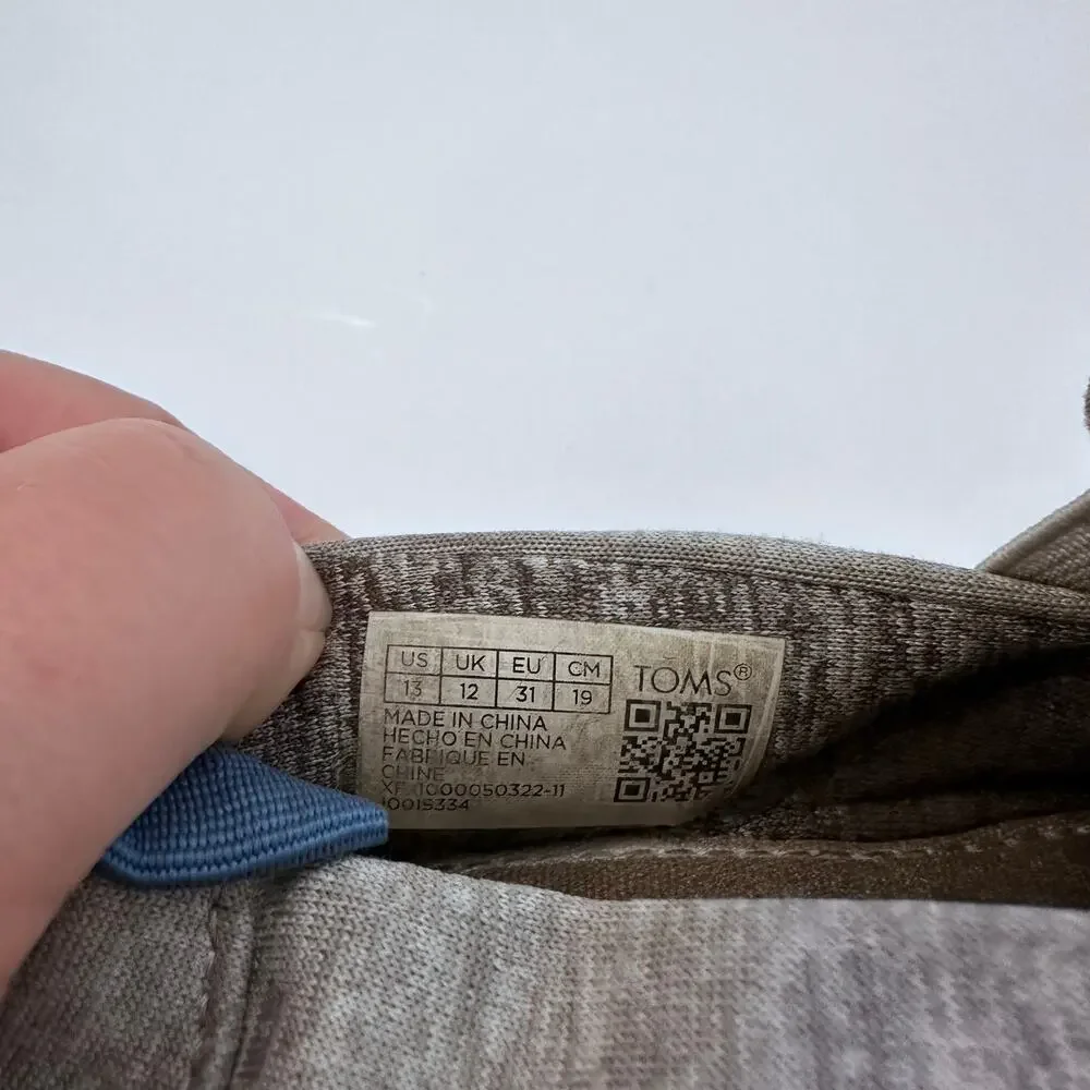 Tom’s grey slip ons size 13